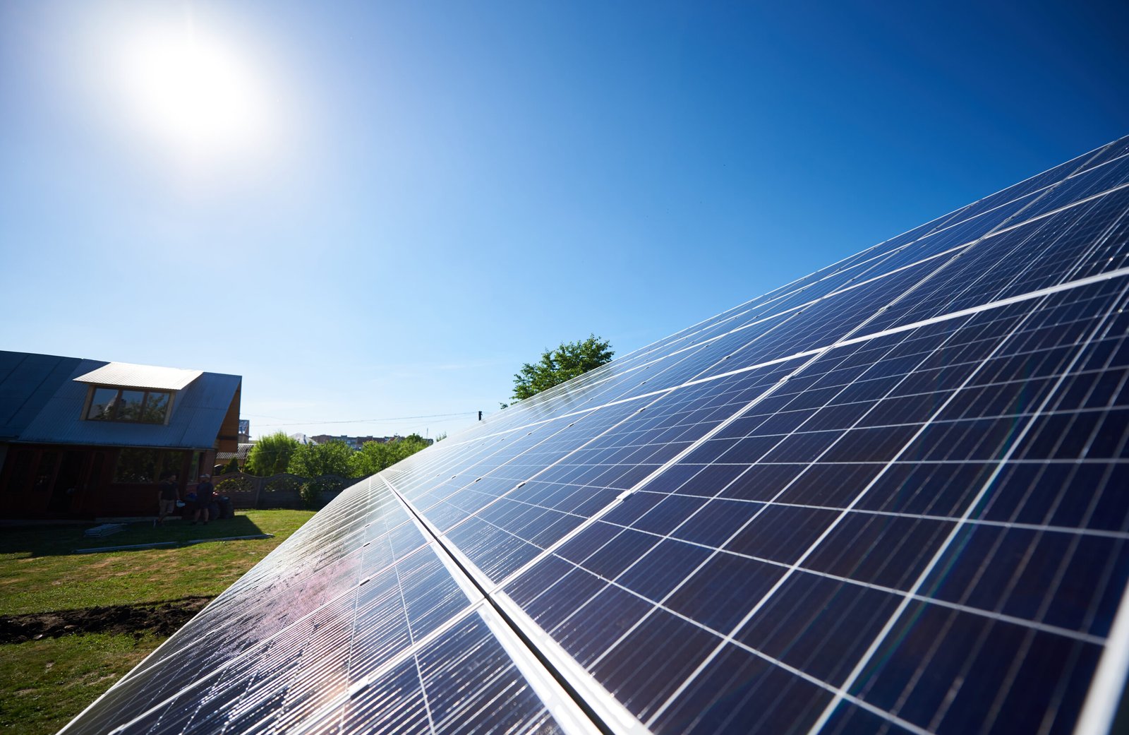 Innovative solar panels mounted on building's facade. new modern technology using renewable solar energy, saving natural, ecological resources. Environment friendly. Smart exterior building.